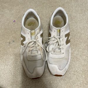 Size 10 women’s gold and white shoes